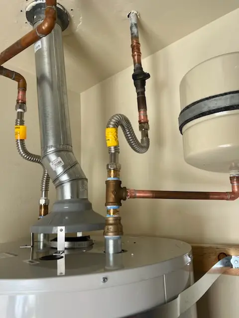 Water heater installation and plumbing repair in Pineville